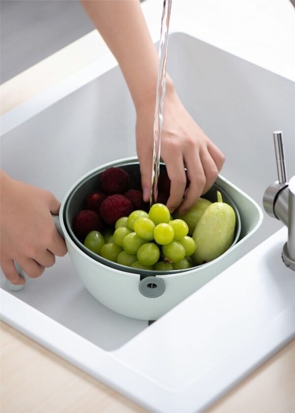 9-in-1 vegetable cutter with 7 blades and strainer bowl for slicing, chopping, and draining fruits, vegetables, and pasta