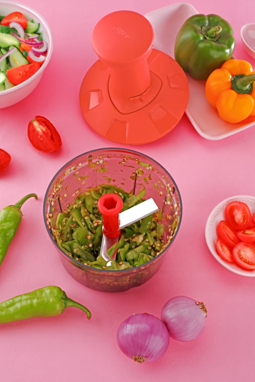 Nova Push Chopper with stainless steel blades and food-grade container