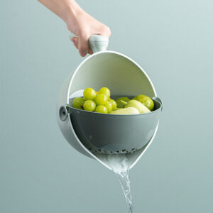 9-in-1 vegetable cutter with 7 blades and strainer bowl for slicing, chopping, and draining fruits, vegetables, and pasta